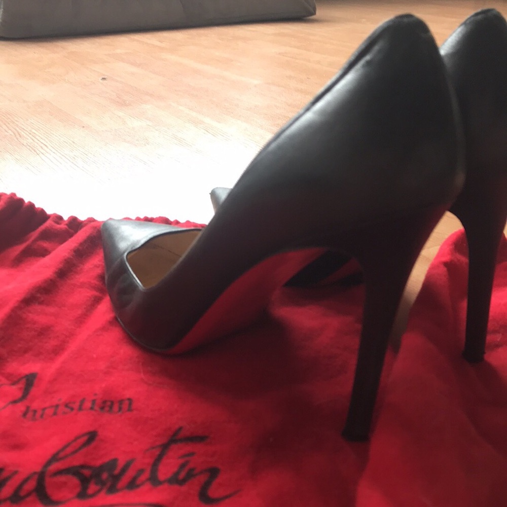 Christian Louboutin - black stilettos